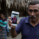 Domingo Caal Chub, 61, and a photograph of his granddaughter, Jakelin Caal Maquín.